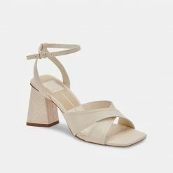 DOLCEVITA TIKI HEELS CREAM LEATHER SANDALS