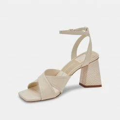 DOLCEVITA TIKI HEELS CREAM LEATHER SANDALS