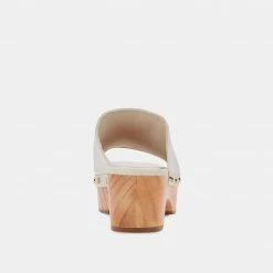 DOLCEVITA DORADO MULES BONE LEATHER SANDALS