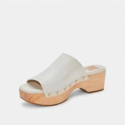 DOLCEVITA DORADO MULES BONE LEATHER SANDALS