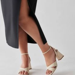 DOLCEVITA TIKI HEELS CREAM LEATHER SANDALS